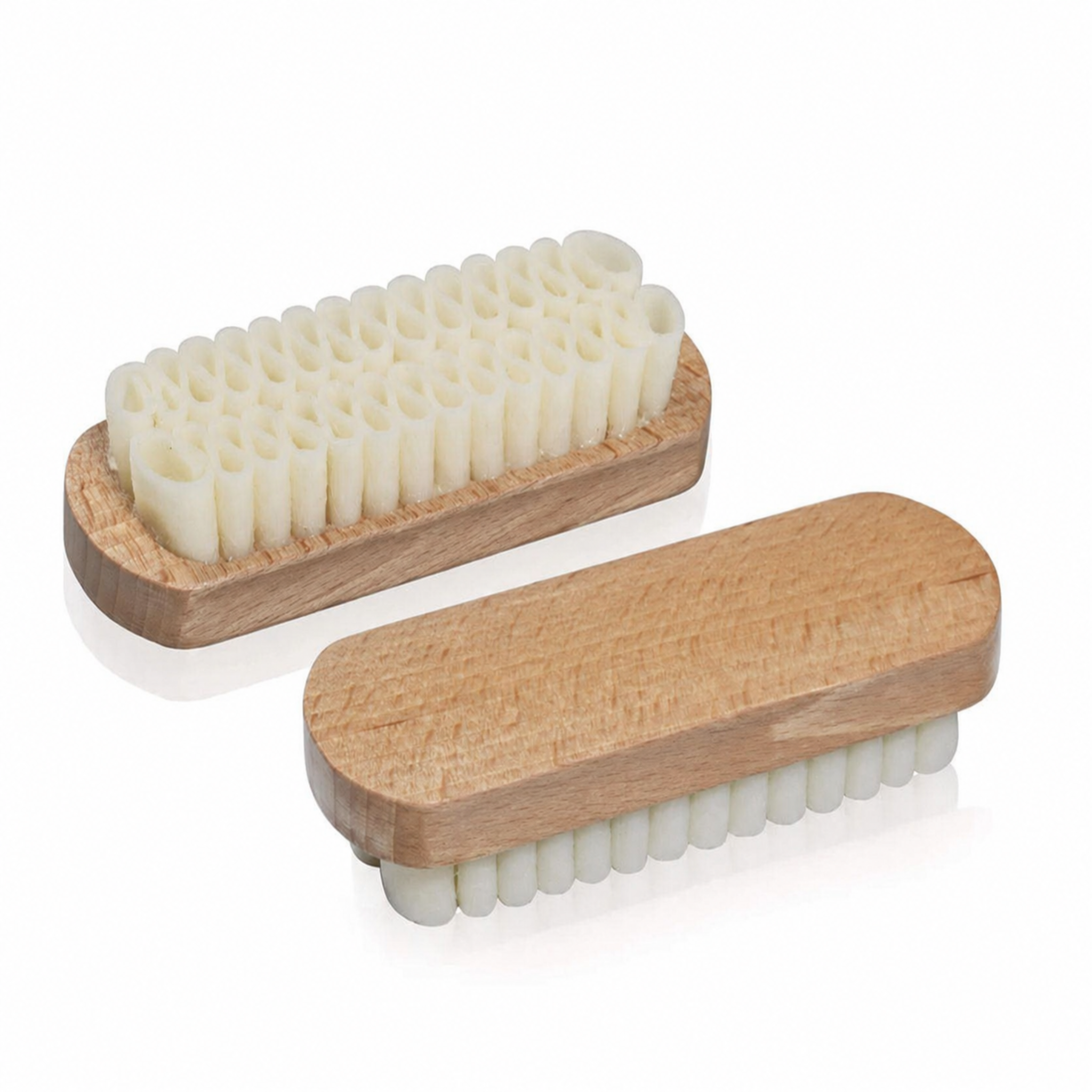Two wooden shoe brushes with white bristles on a white background